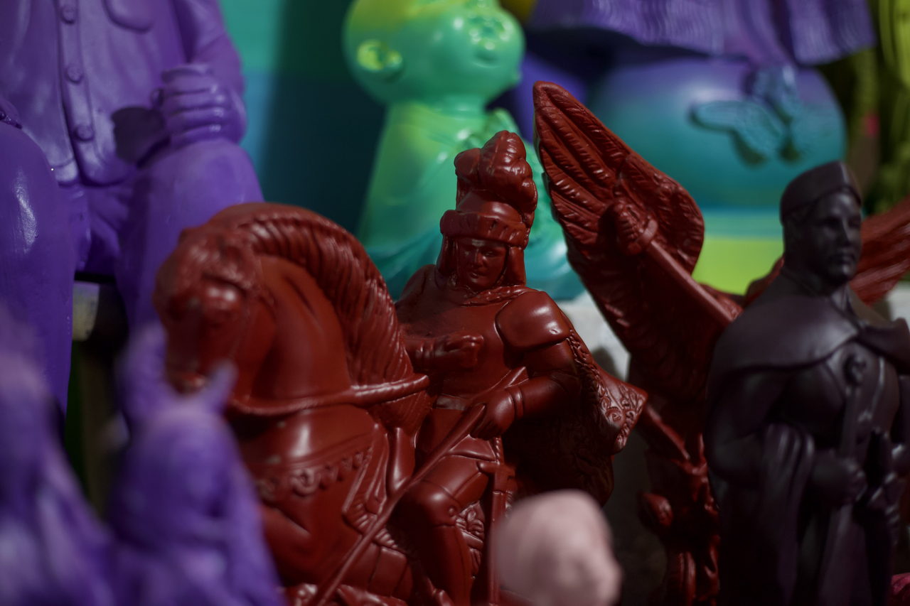 Red Saint George on horseback among the coloured figures