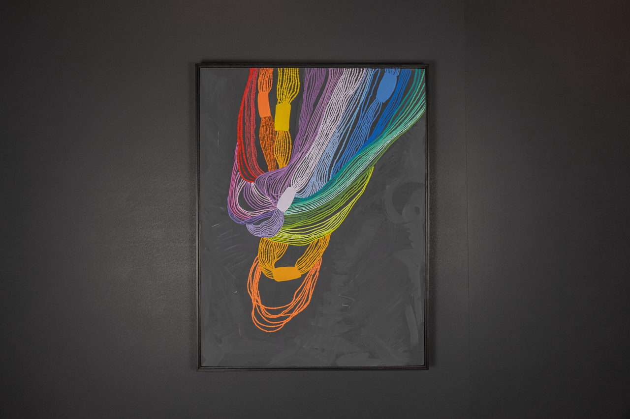 Toile avec un faisceau de fils colorés en cascade