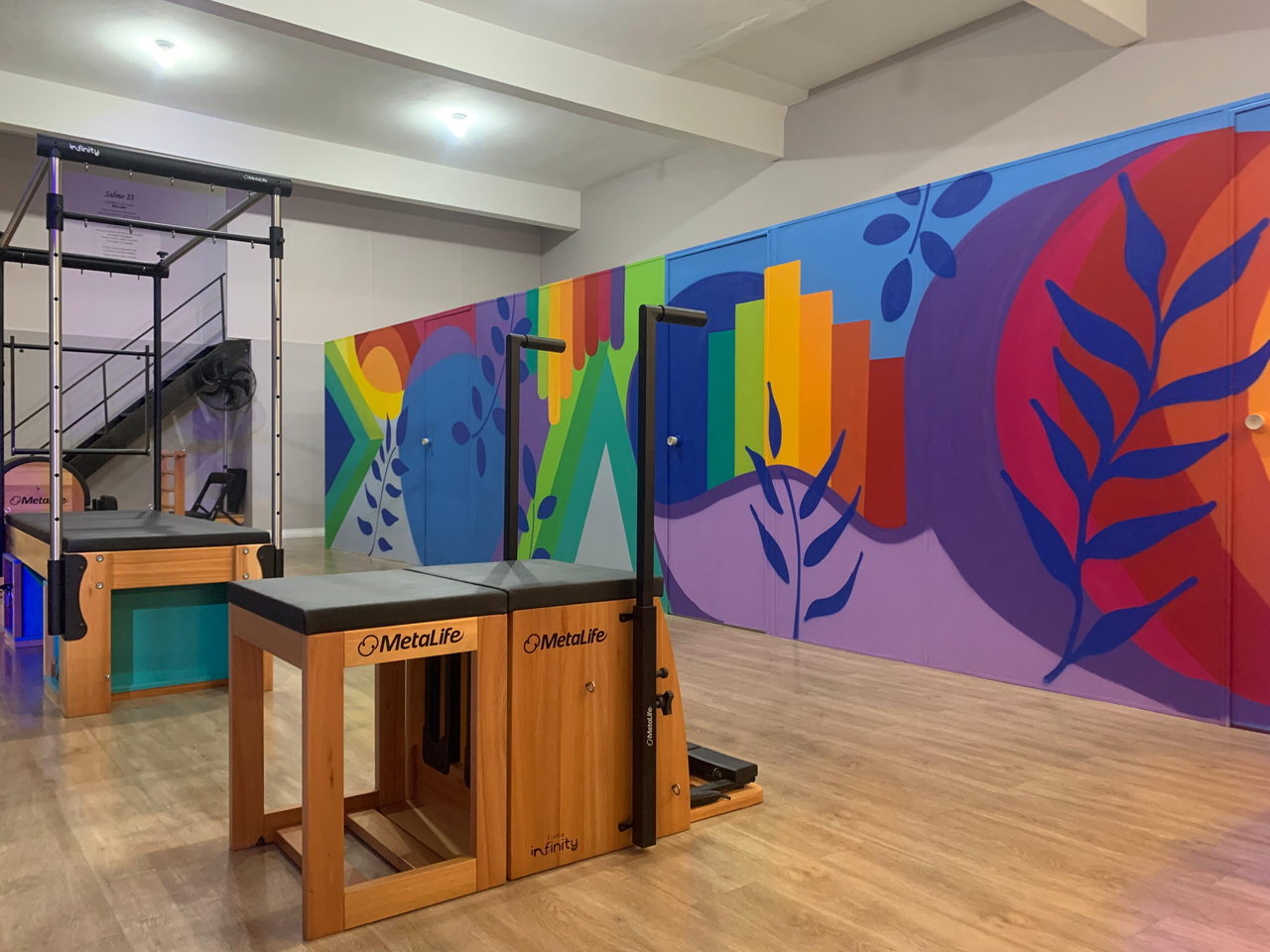 Pilates studio mural in a wide horizontal shot
